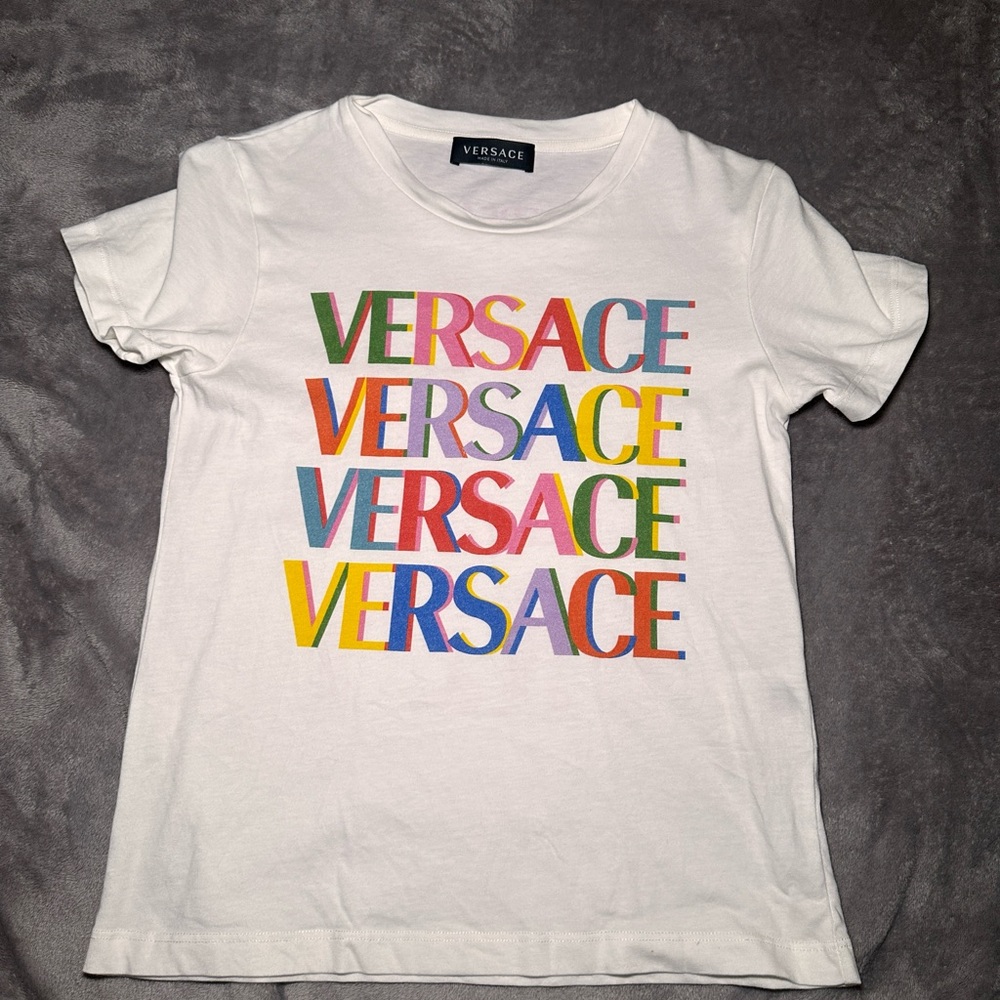 Like new , girls Versace top , worn once in great condition, size 10A